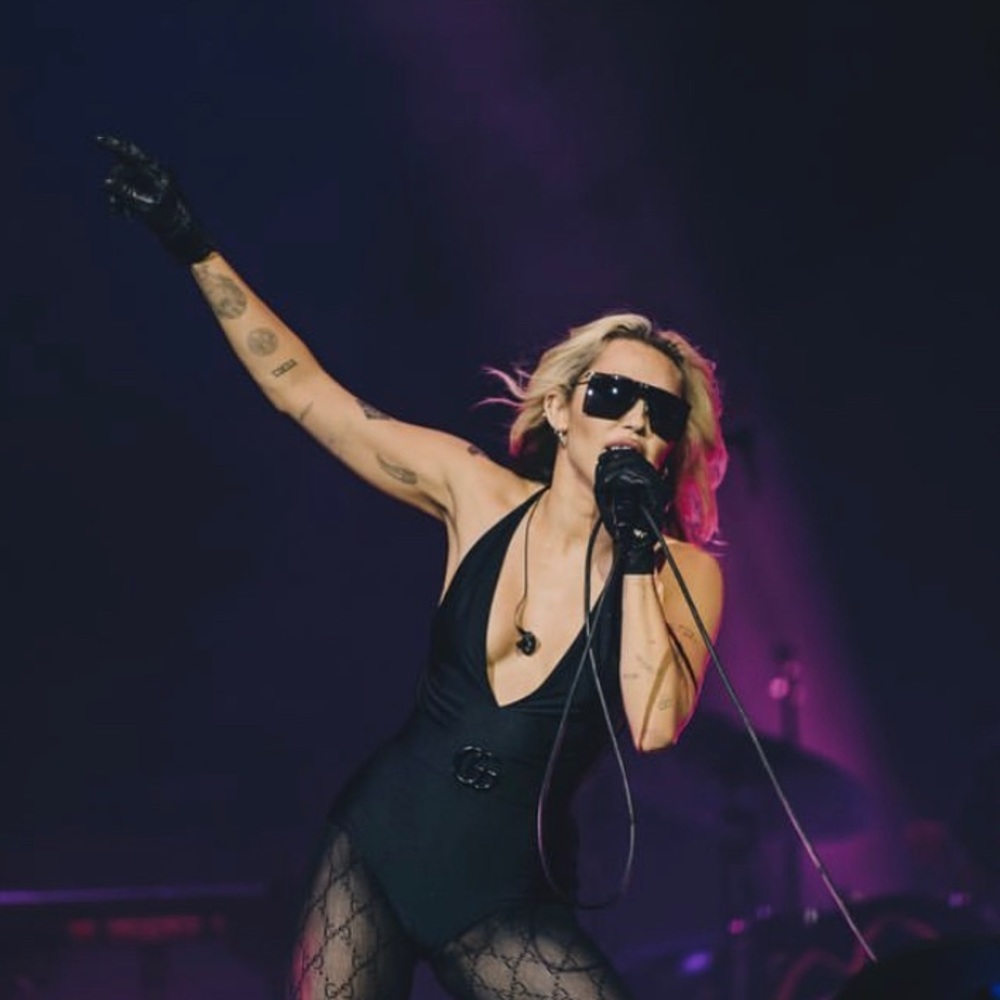 Gucci Sparkling black swimsuit or bodysuit with GG logo belt Miley Cyrus concert